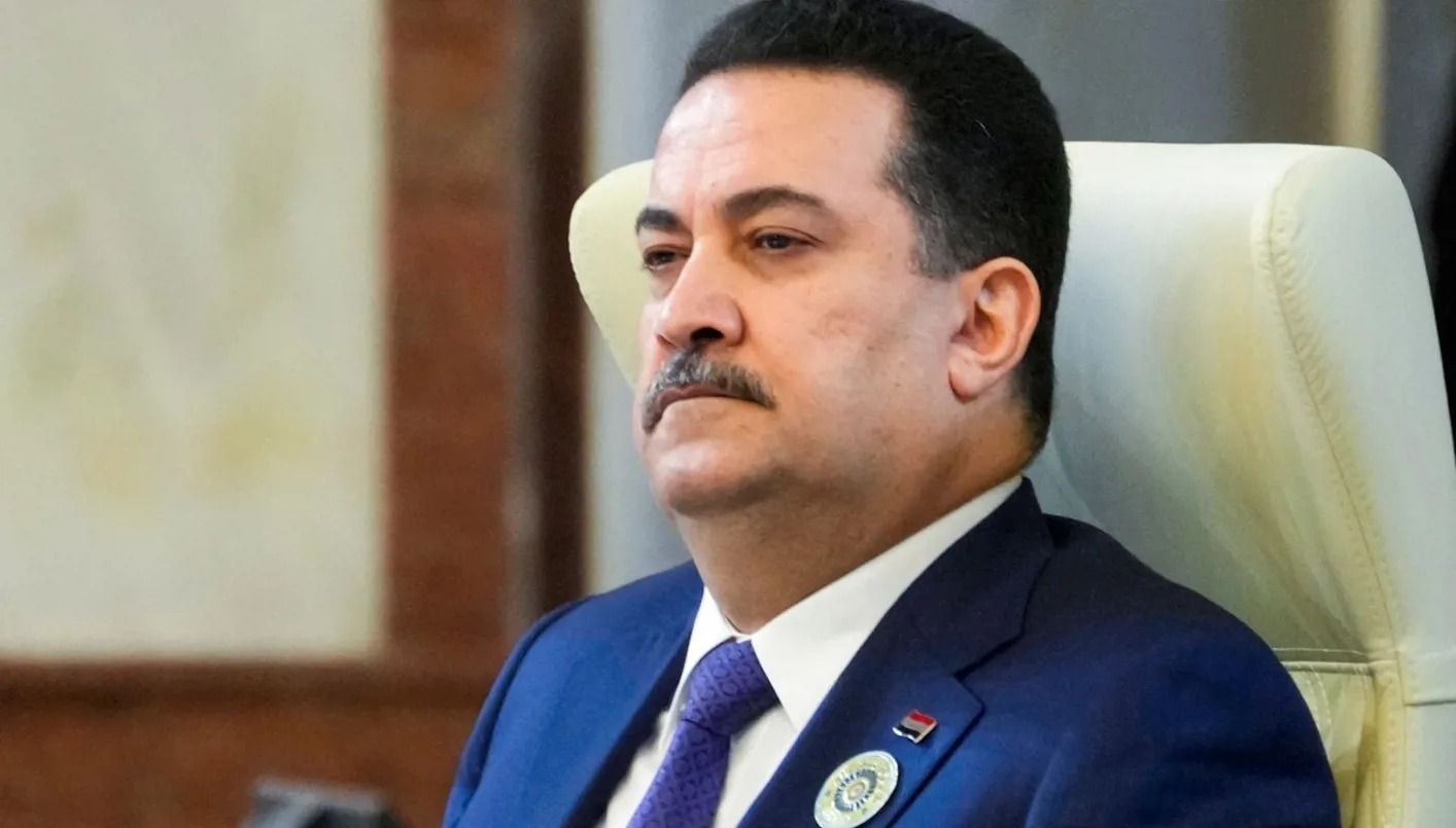 السوداني في قمة بغداد (أ ف ب).
