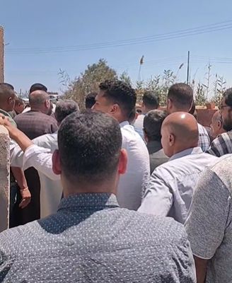 جانب من تشييع الجثمان جانب من تشييع الجثمان