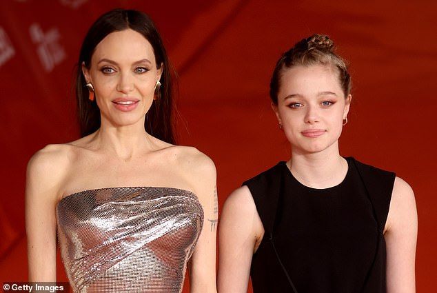 Shiloh, who was 14 at the time, was reportedly among other children who wanted to testify, but a judge agreed with Pitt and prevented the testimony before awarding him joint custody; seen with Jolie in 2021 in Rome