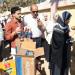توزيع زجاجات مياه وشيكولاتة على طلاب الثانوية العامة فى الفيوم